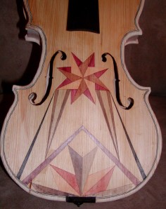 The front is almost done.  I did the side and past the purfling at the same time.