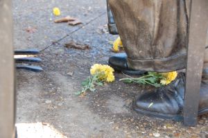 11/14/2012:  Hoagy has music and flowers at his feet.